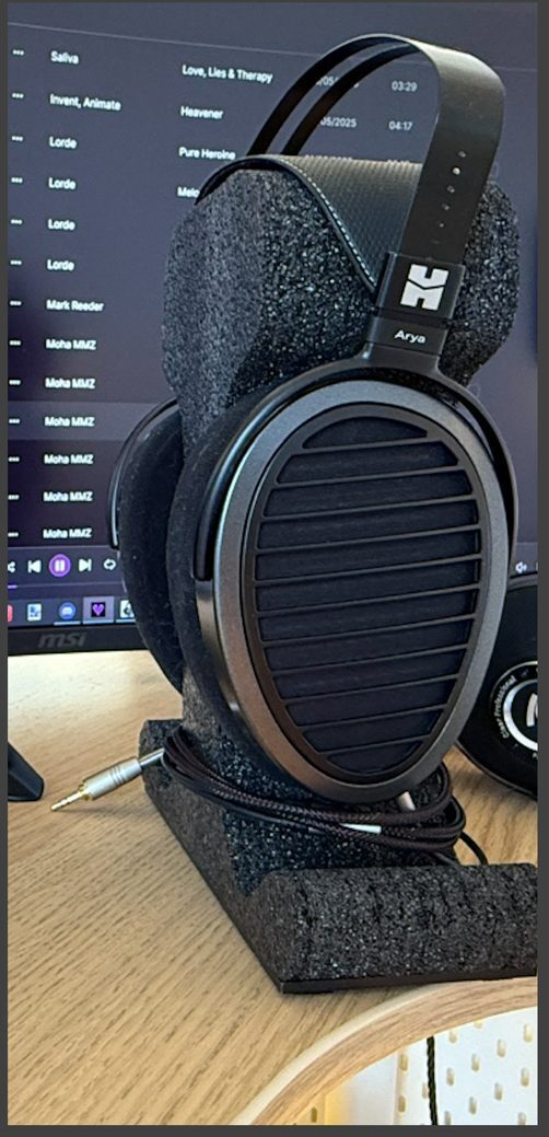 HiFiMAN Arya headphones on stand